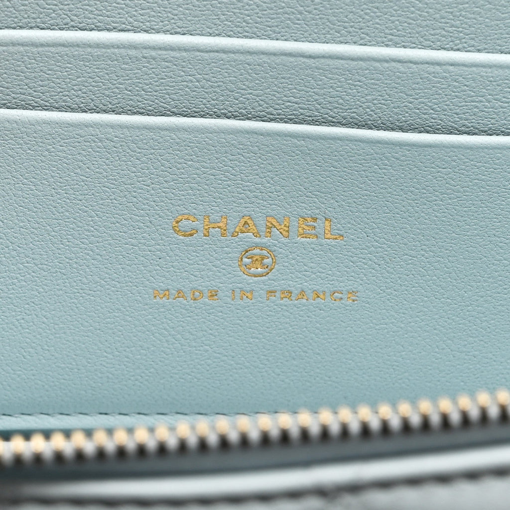 Lambskin Quilted Small Top Handle Vanity Case With Chain Light Blue