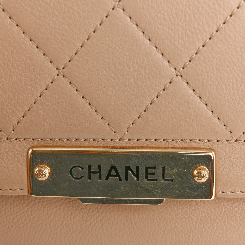 Grained Calfskin Quilted Medium Label Click Flap Bag Beige