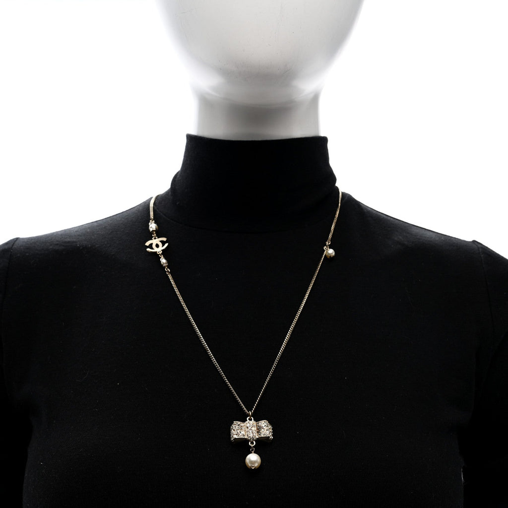 Metal Crystal Pearl CC Bow Necklace Gold