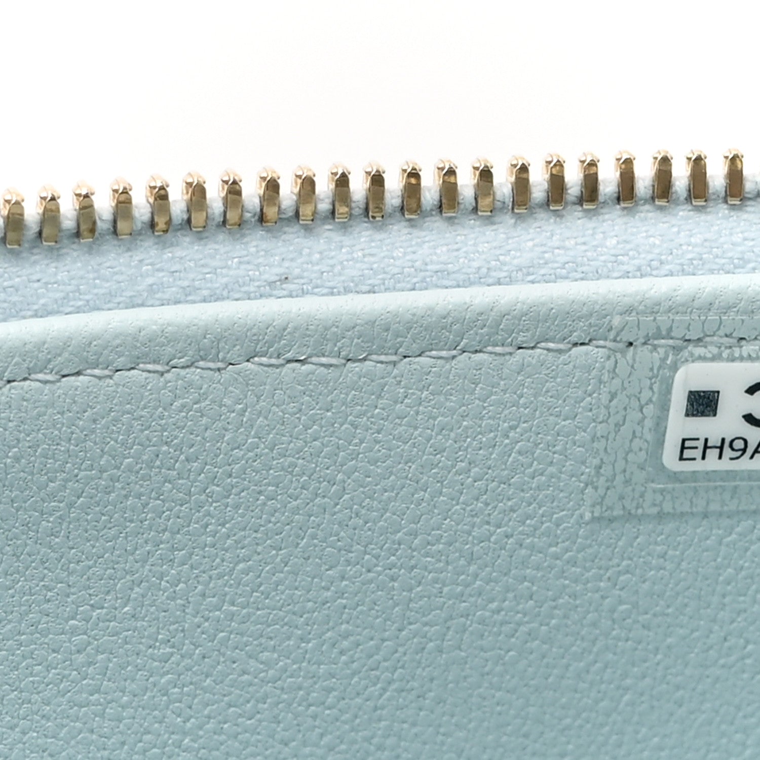 Lambskin Quilted Small Top Handle Vanity Case With Chain Light Blue